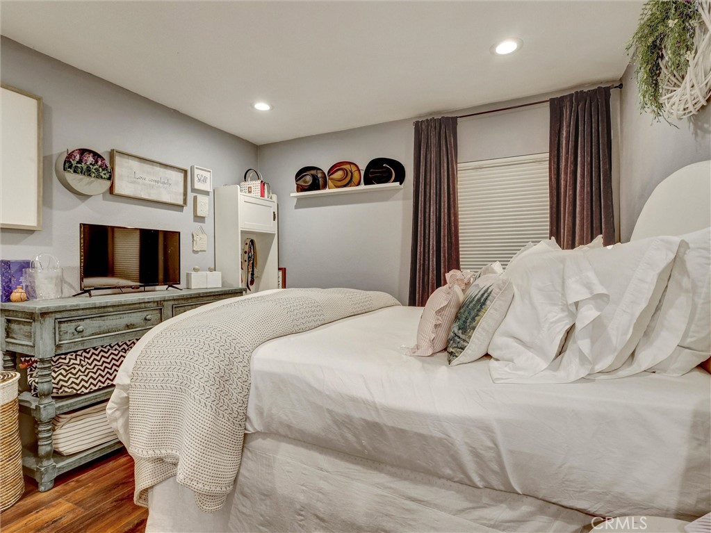 1200 West Lambert Road, Unit 44 La Habra, CA 90631 - Photo 10 of 33 a bedroom with a bed and a television