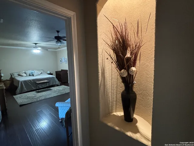 a bathroom with a glass shower door