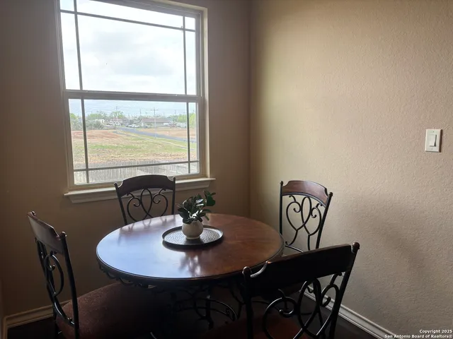 a bathroom with a sink vanity and mirror