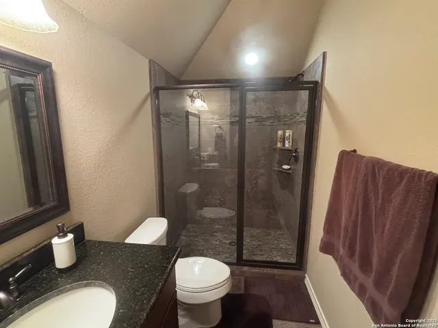 a view of a kitchen with a sink and dishwasher