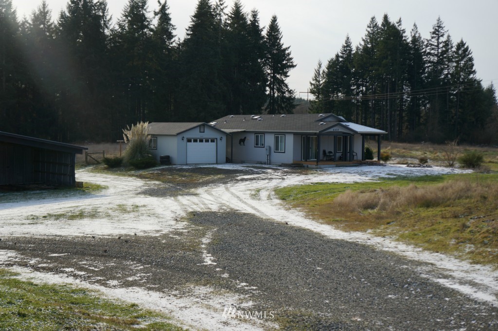 4435 Maytown Road Southwest Olympia, WA 98512 - Photo 24 of 25 a view of a house with a yard