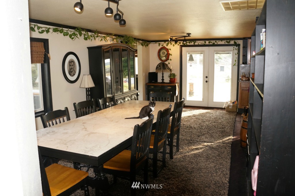 4435 Maytown Road Southwest Olympia, WA 98512 - Photo 6 of 25 a dining room with furniture and window