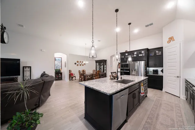 a kitchen with granite countertop lots of counter top space