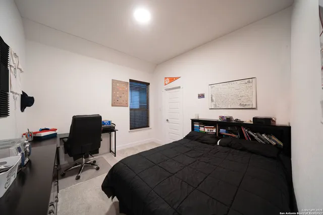 a view of a porch with a floor to ceiling window and a yard