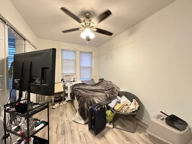 a view of a livingroom with furniture and furniture