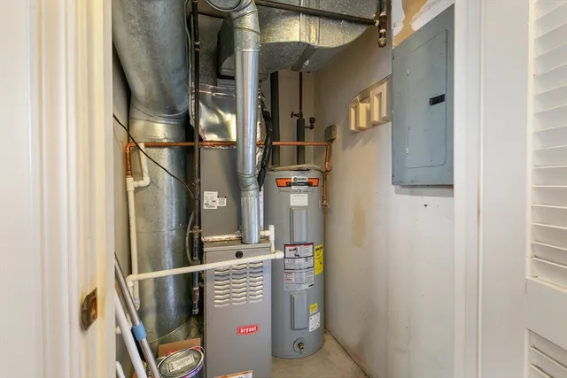 a view of a hallway with closet and entryway