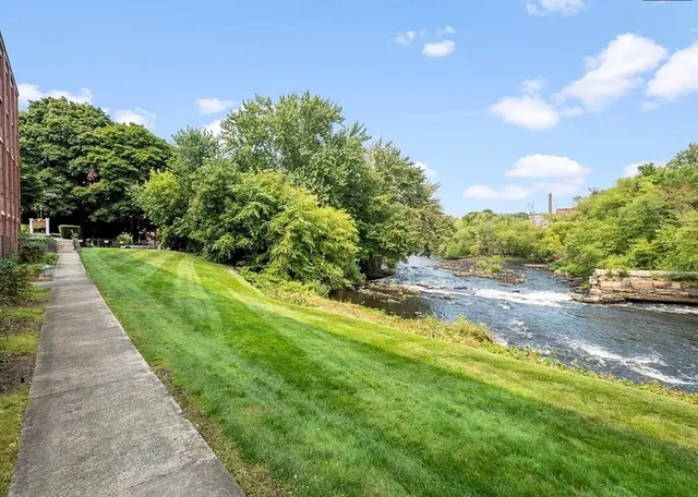 a view of a pathway both side of the house