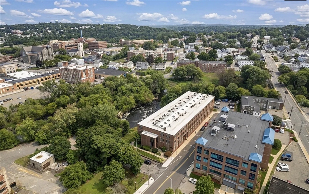 128 Warren Street, Unit 12 Lowell, MA 01852 - Photo 24 of 24 an aerial view of a city