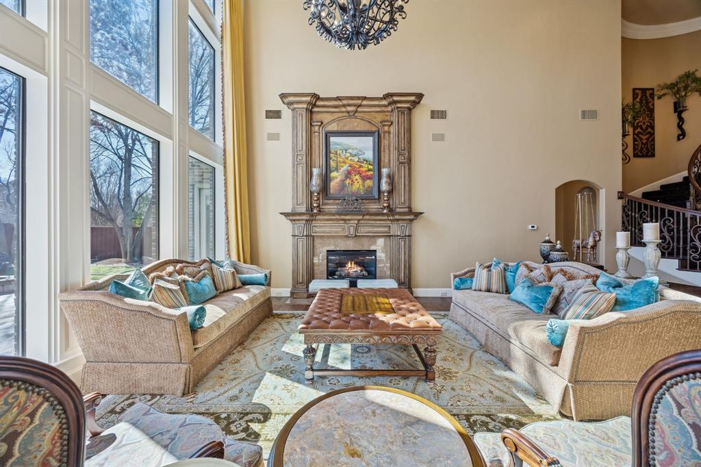 6640 Briar Ridge Lane Plano, TX 75024 - Photo 10 of 40 Formal Living room chandelier mechanically raises and lowers for easy cleaning and maintenance..