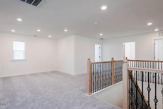 an aerial view of a house with a ocean view