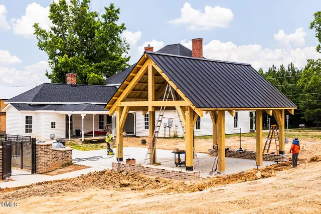 an empty room with furniture and window