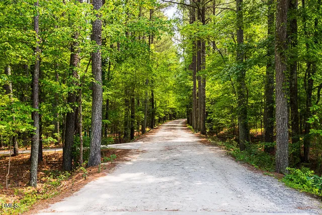 a view of a brick house with a sink and a window