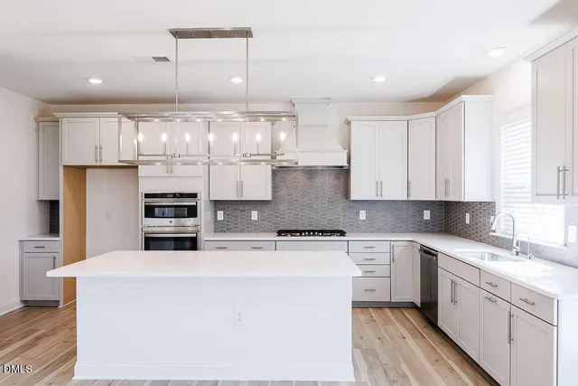 a view of entryway with wooden floor and stairs
