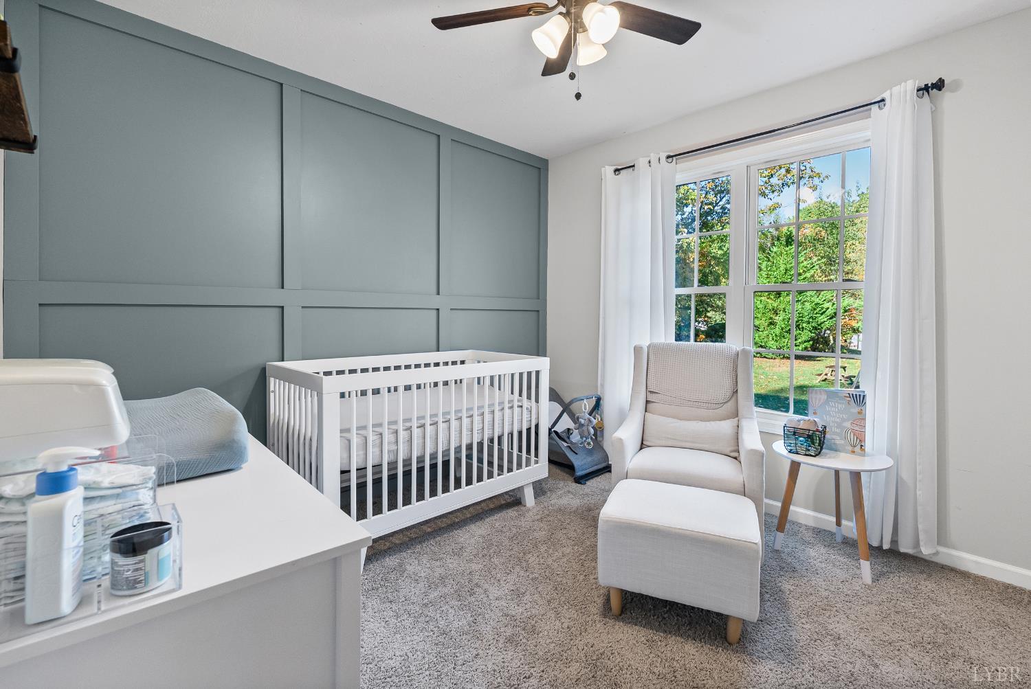 2739 Chilton Road Appomattox, VA 24522 - Photo 14 of 30 a bedroom with furniture and a chandelier