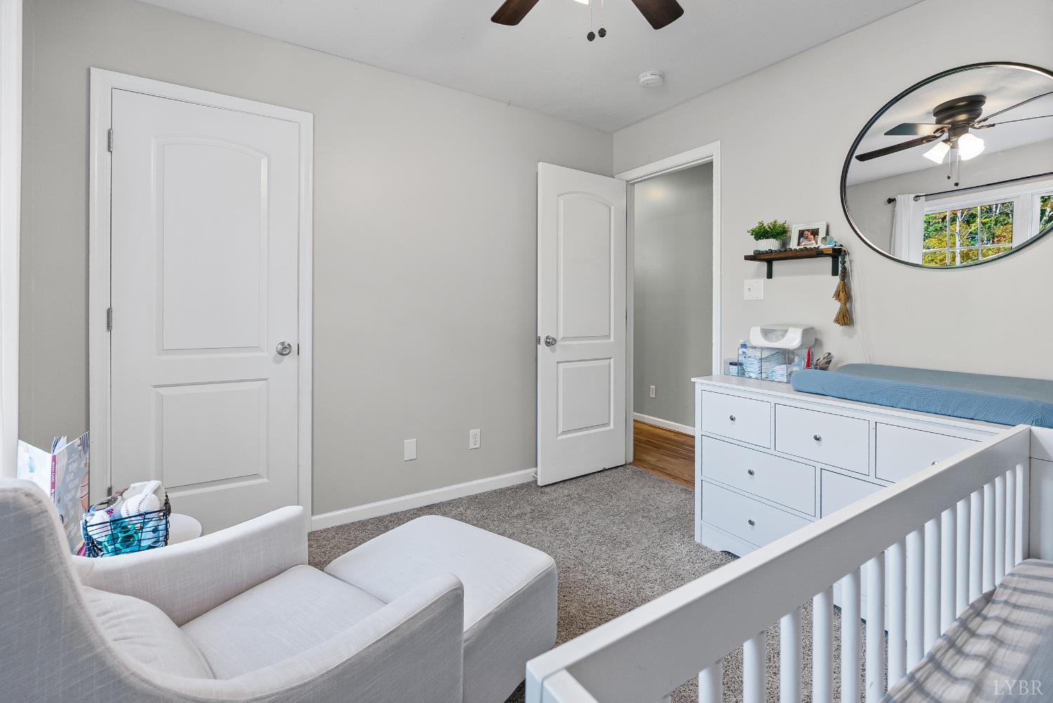 2739 Chilton Road Appomattox, VA 24522 - Photo 15 of 30 a bedroom with a bed and a dresser
