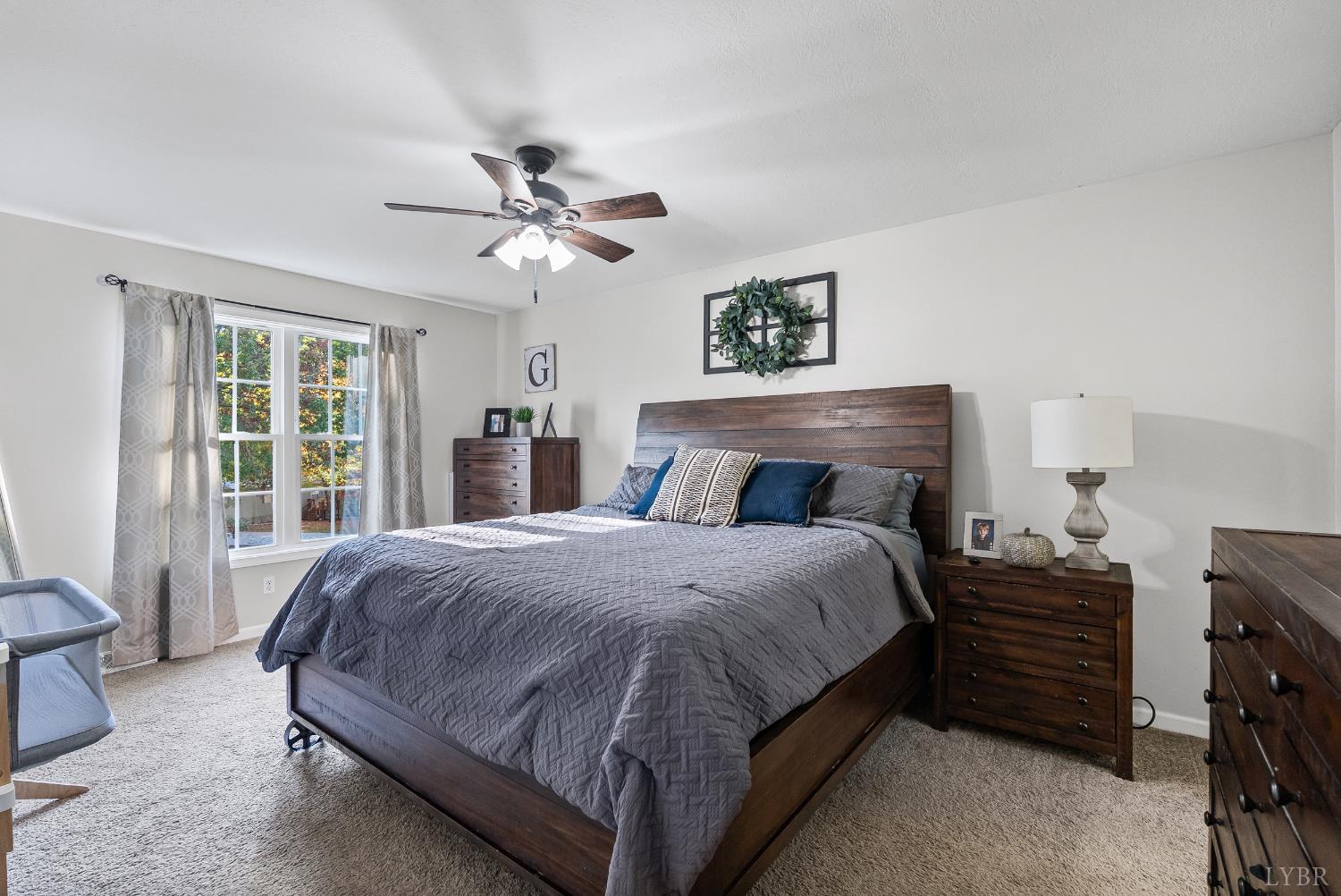 2739 Chilton Road Appomattox, VA 24522 - Photo 18 of 30 a bedroom with a bed dresser and a window