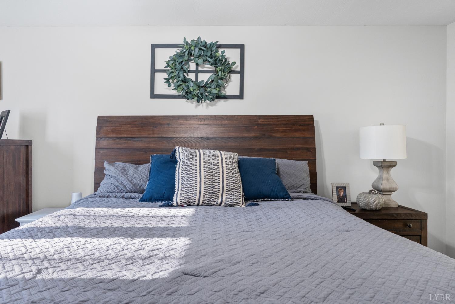 2739 Chilton Road Appomattox, VA 24522 - Photo 19 of 30 a bedroom with a bed and painting on wall