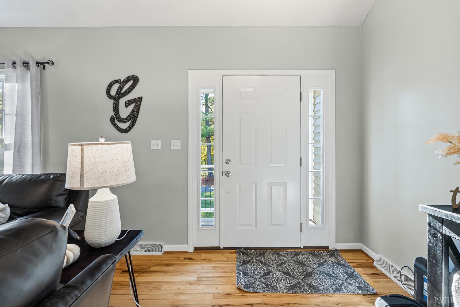 2739 Chilton Road Appomattox, VA 24522 - Photo 2 of 30 a view of room with furniture and wooden floor