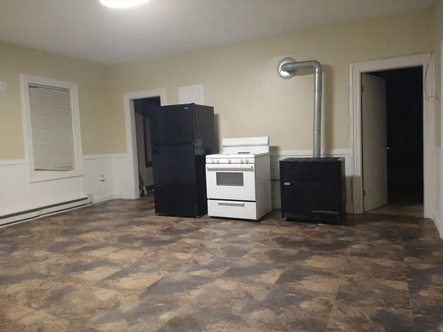 a utility room with washer and dryer