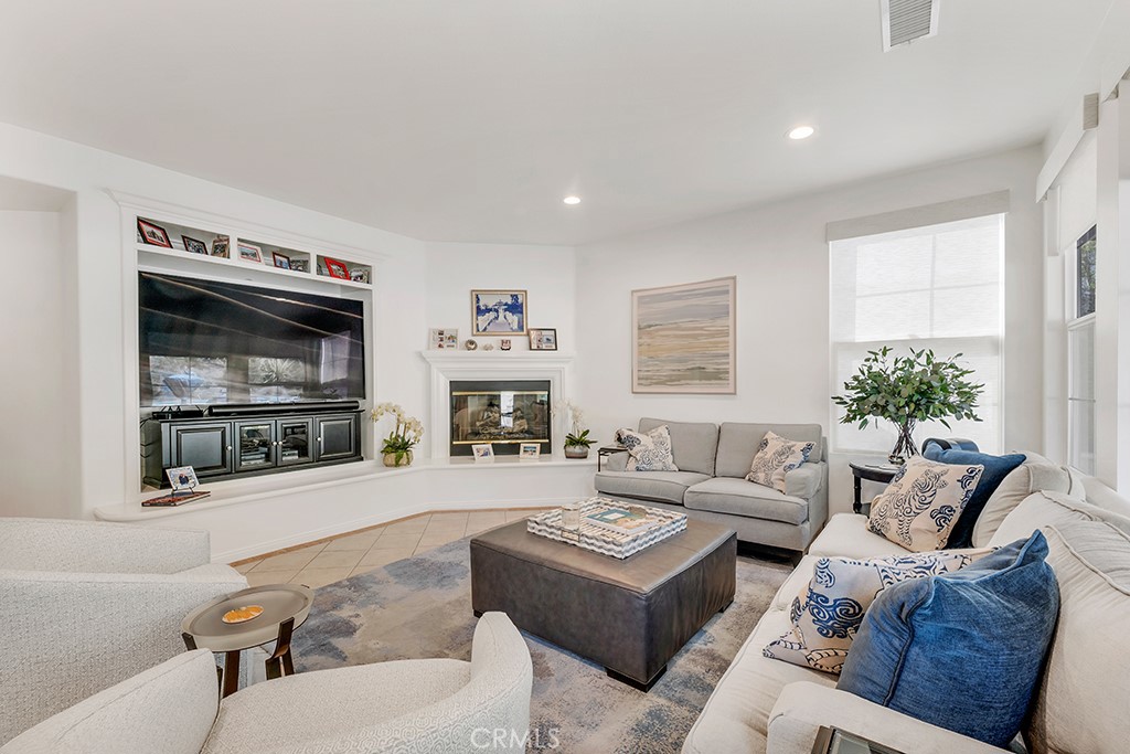 3049 Heavenly Ridge Street Thousand Oaks, CA 91362 - Photo 17 of 50 a living room with furniture and a flat screen tv