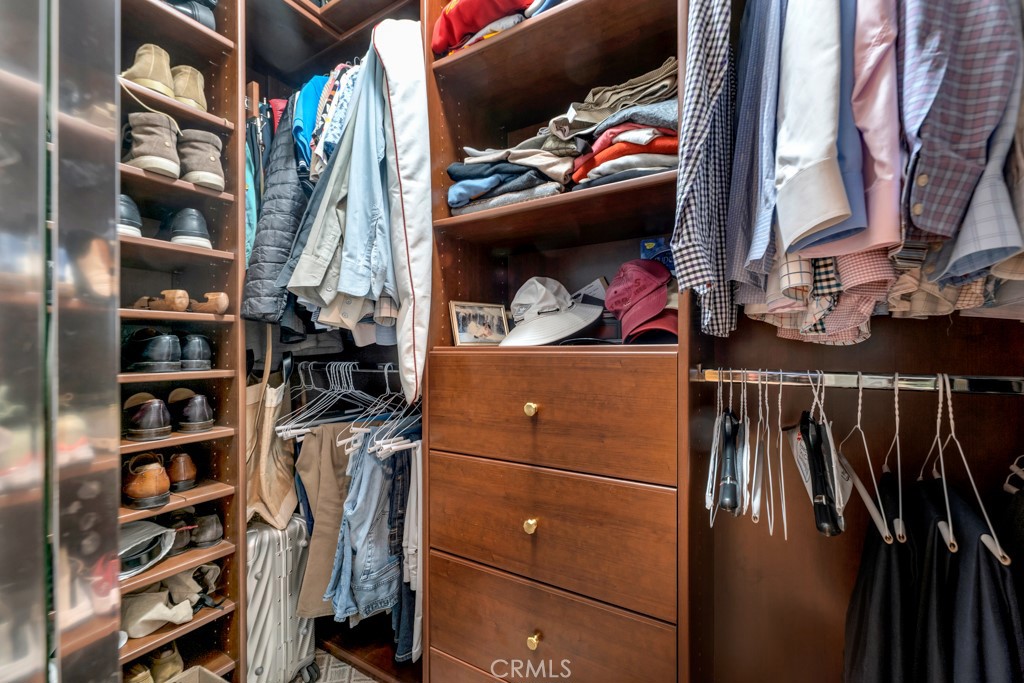 3049 Heavenly Ridge Street Thousand Oaks, CA 91362 - Photo 26 of 50 a view of walk in closet with clothes and shoes