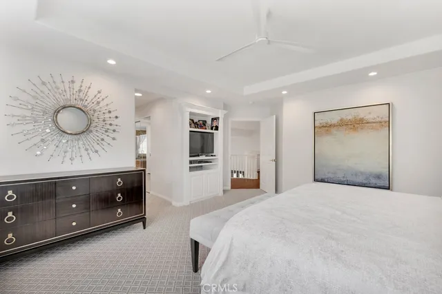 a spacious bathroom with a double vanity sink and a mirror