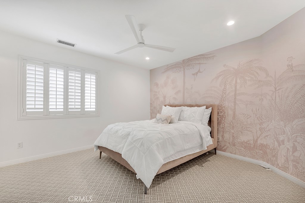 3049 Heavenly Ridge Street Thousand Oaks, CA 91362 - Photo 31 of 50 a large bedroom with a bed and a window