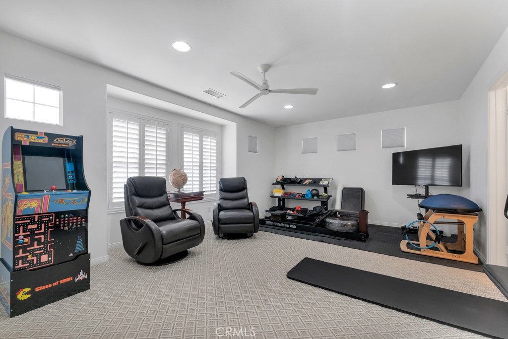 3049 Heavenly Ridge Street Thousand Oaks, CA 91362 - Photo 33 of 50 a living room with furniture and a flat screen tv