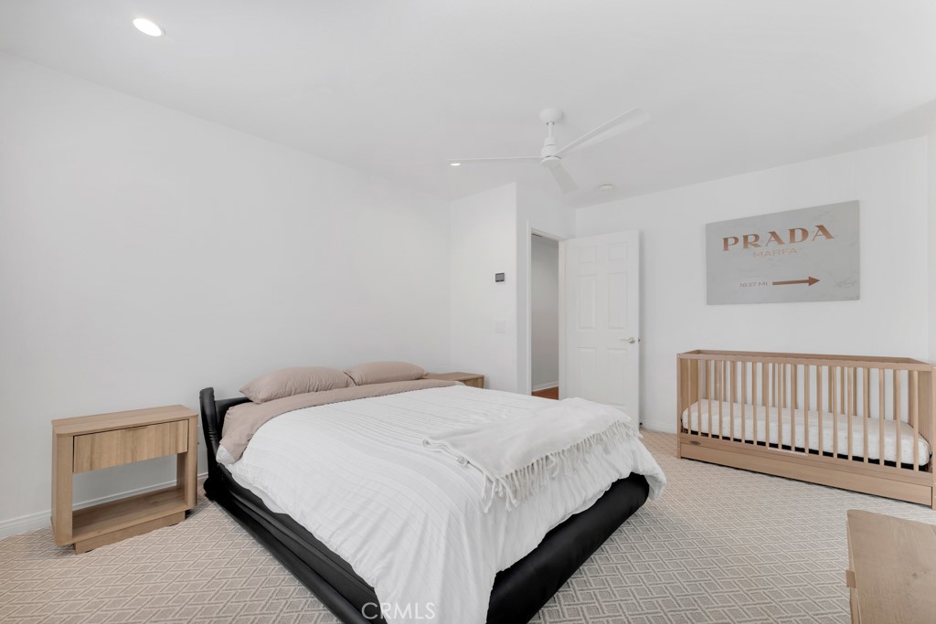 3049 Heavenly Ridge Street Thousand Oaks, CA 91362 - Photo 41 of 50 a bedroom with a bed and a window