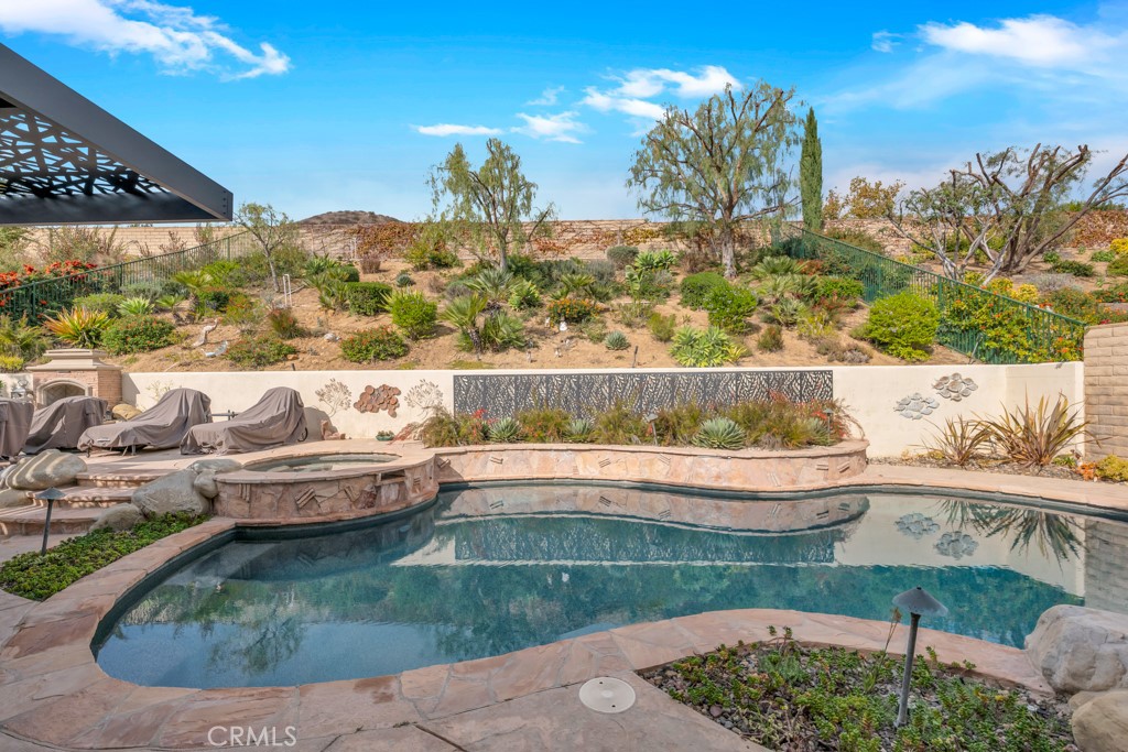 3049 Heavenly Ridge Street Thousand Oaks, CA 91362 - Photo 45 of 50 a view of swimming pool with outdoor seating