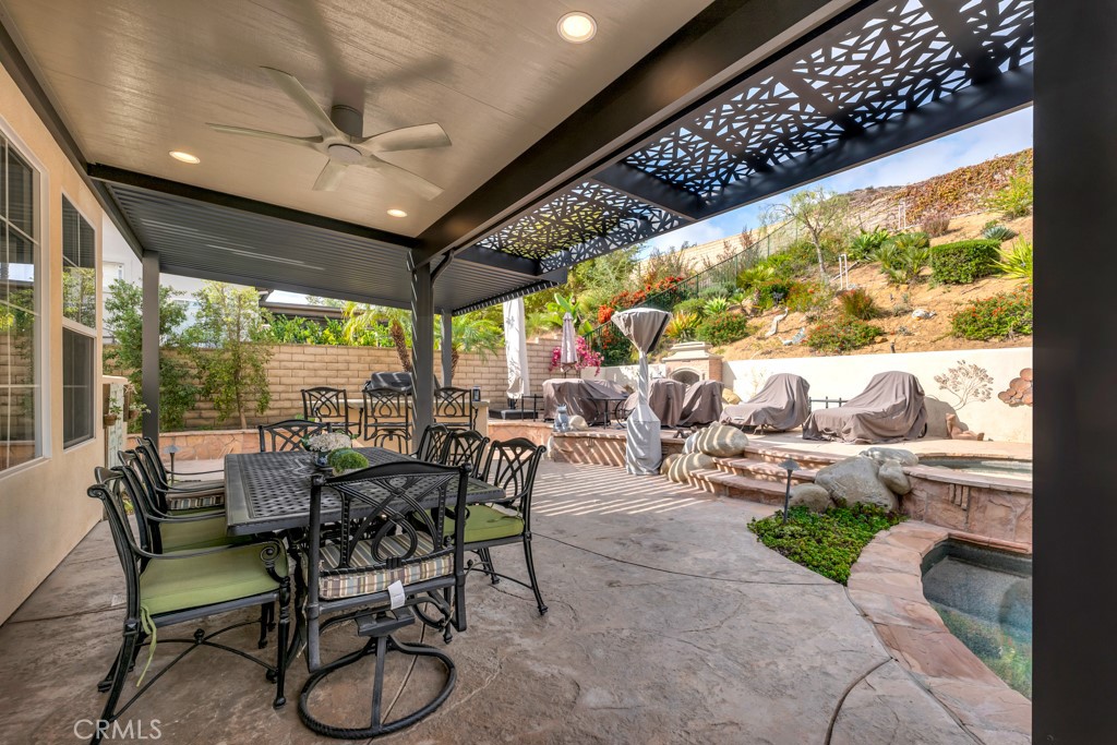 3049 Heavenly Ridge Street Thousand Oaks, CA 91362 - Photo 46 of 50 a view of a porch with furniture and a yard
