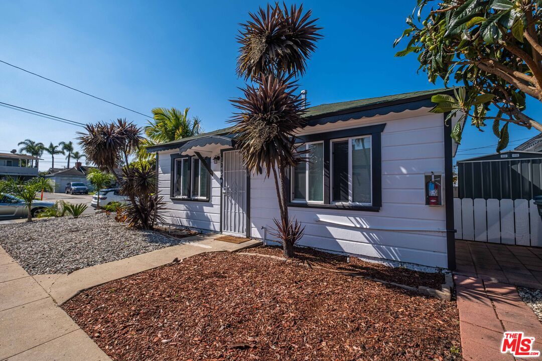 1737 252nd Street Lomita, CA 90717 - Photo 11 of 29 a front view of a house with garden