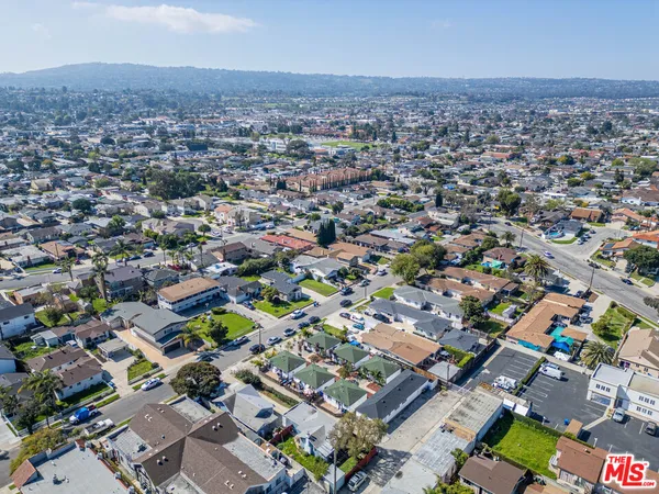 an aerial view of a city with lots of residential buildings