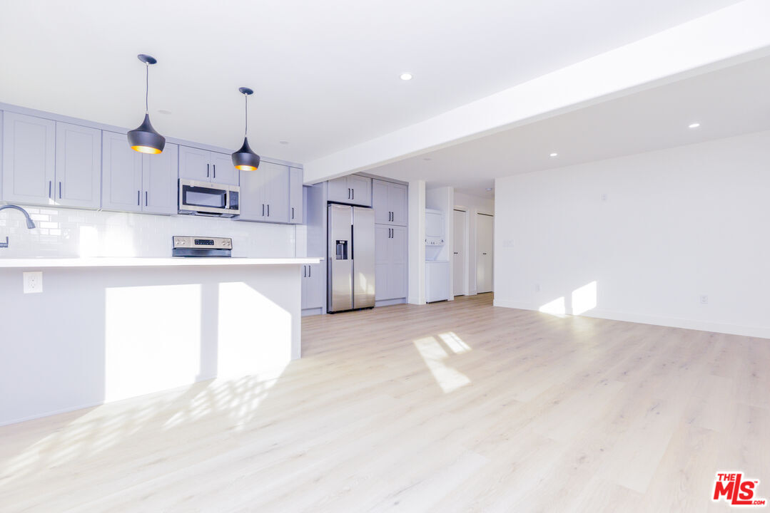 1737 252nd Street Lomita, CA 90717 - Photo 22 of 29 a view of a kitchen with a sink and cabinets