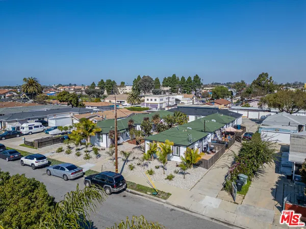 an aerial view of a building with outdoor area