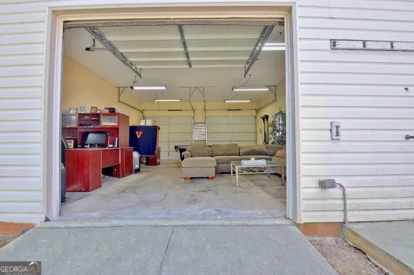 a view of a porch with seating space