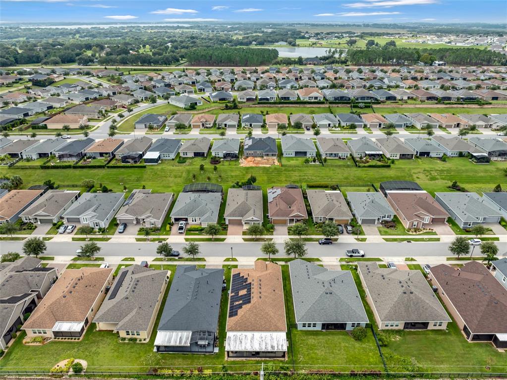 176 Silver Maple Road Groveland, FL 34736 - Photo 40 of 45 an aerial view of residential houses with outdoor space