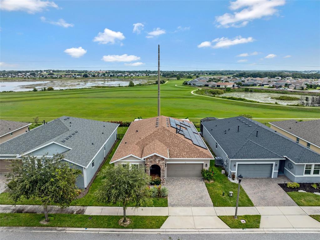 176 Silver Maple Road Groveland, FL 34736 - Photo 4 of 45 an aerial view of a house with a garden