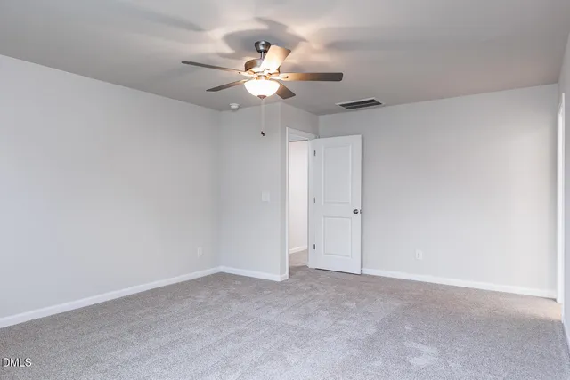 a view of a chandelier fan in a room