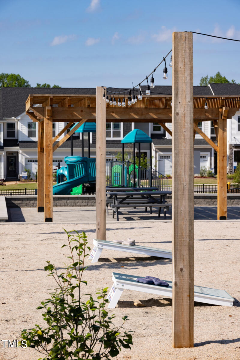 136 Siebold Street Garner, NC 27529 - Photo 38 of 43 a view of a building with a porch