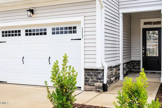 a view of a balcony with potted plants