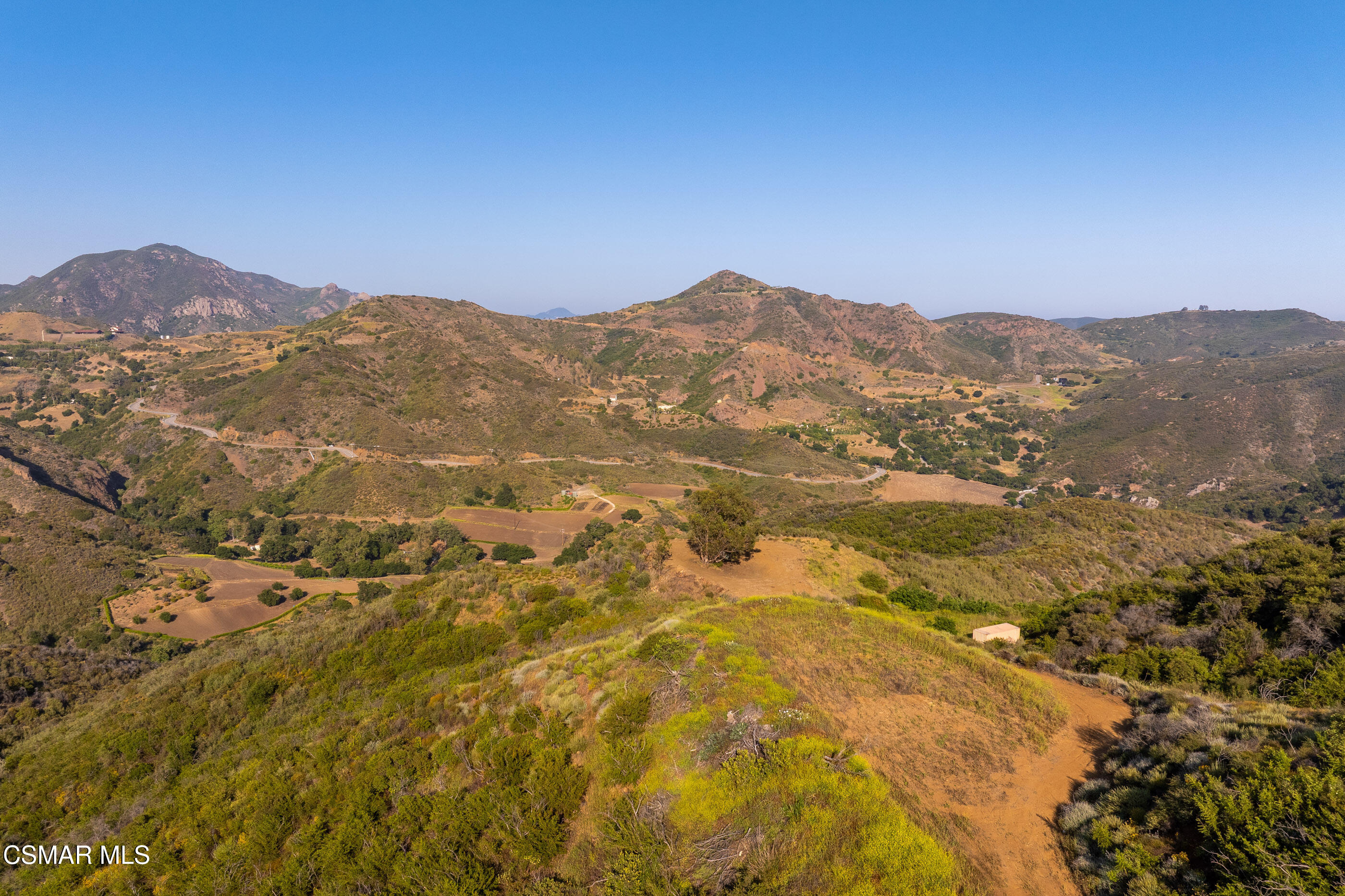 0 Malibu Road Agoura Hills, CA 91301 - Photo 19 of 33 a view of a mountain range in a cloudy sky