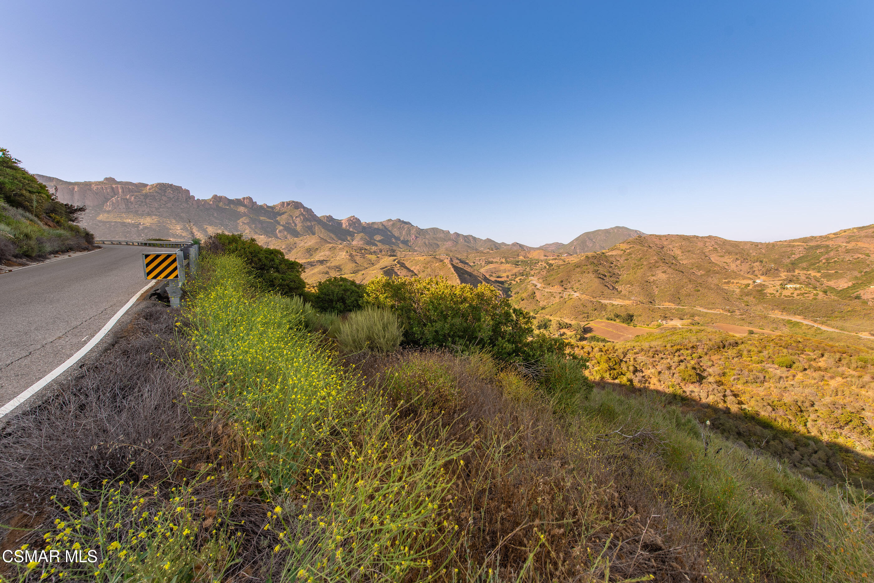 0 Malibu Road Agoura Hills, CA 91301 - Photo 32 of 33 a view of a mountain range with a lush green hillside