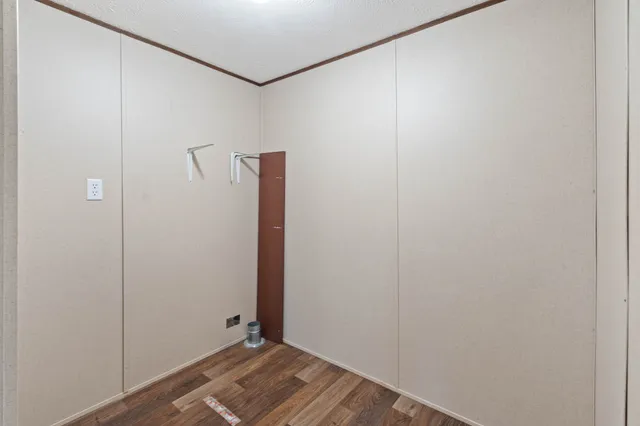 a view of small space with wooden floor