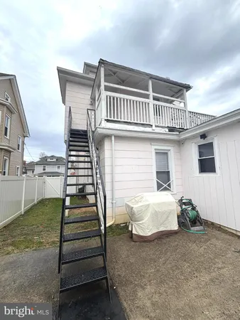a view of livingroom with furniture and staircase