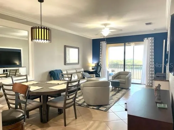 a view of a livingroom with furniture window and outside view