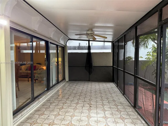 a bathroom with a glass door