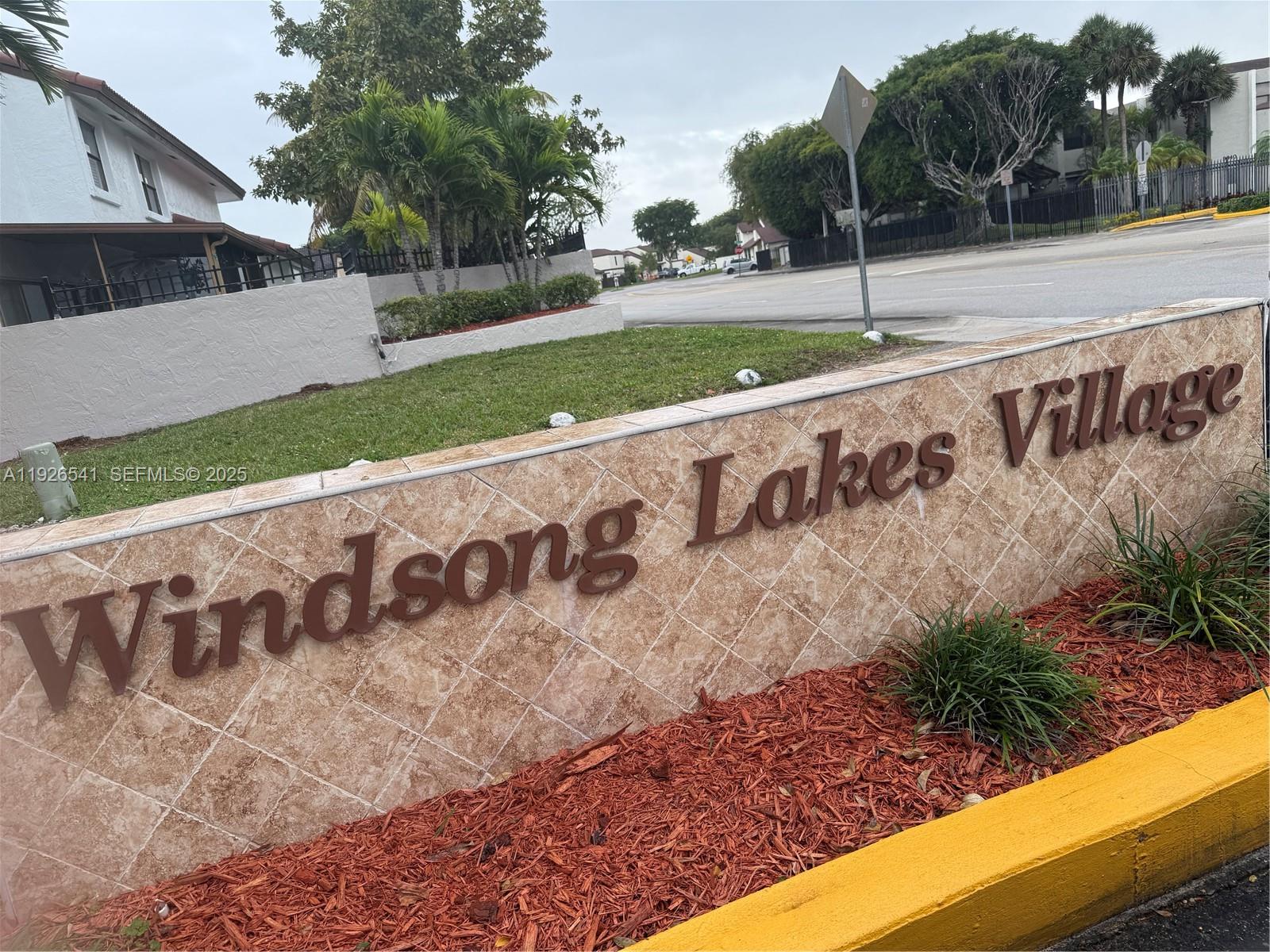 9901 Northwest 9th St Circle, Unit 32 Miami, FL 33172 - Photo 14 of 14 a view of park with sign board