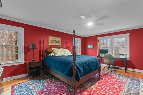 a bedroom with a bed and furniture