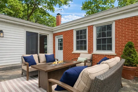 a balcony with furniture and window
